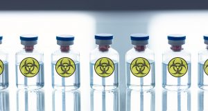 Rangée d'ampoules avec un signe de danger biologique